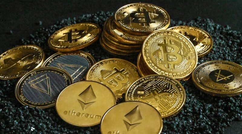 a pile of bitcoins sitting on top of a pile of gravel